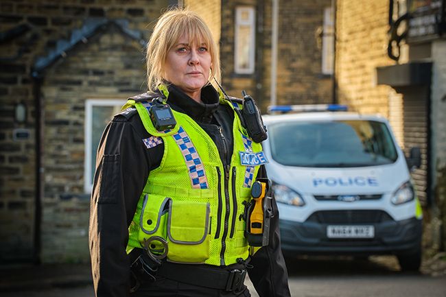 Sarah Lancashire stands in street as Catherine Cawood in Happy Valley