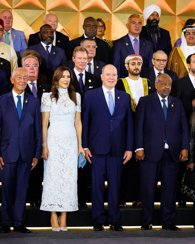 Queen Mary in mint look in crowd of royals and heads of state