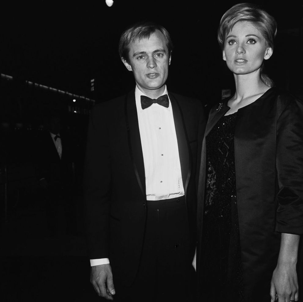 British actor David McCallum and his wife, actress Jill Ireland (1936 - 1990) at a party for the film 'The Greatest Story Ever Told