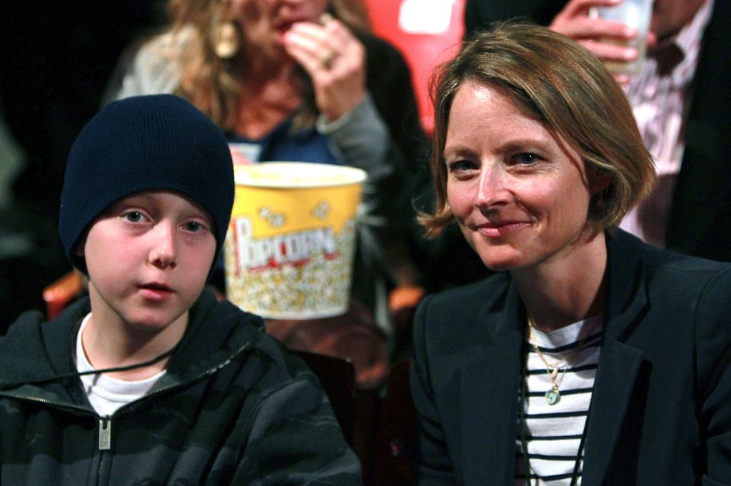 LOS ANGELES, CA - AUGUST 17:  Actress Jodie Foster (R) and son Christopher "Kit" Foster attend the Go-Go's concert at the Greek Theatre on August 17, 2011 in Los Angeles, California.  (Photo by David Livingston/Getty Images)