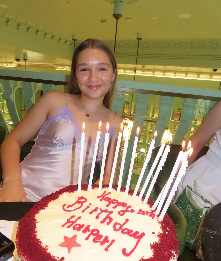 Harper Seven with her birthday cake in the Prada Caffe