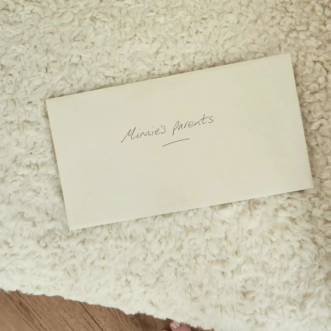 an envelope addressed to minnies parents