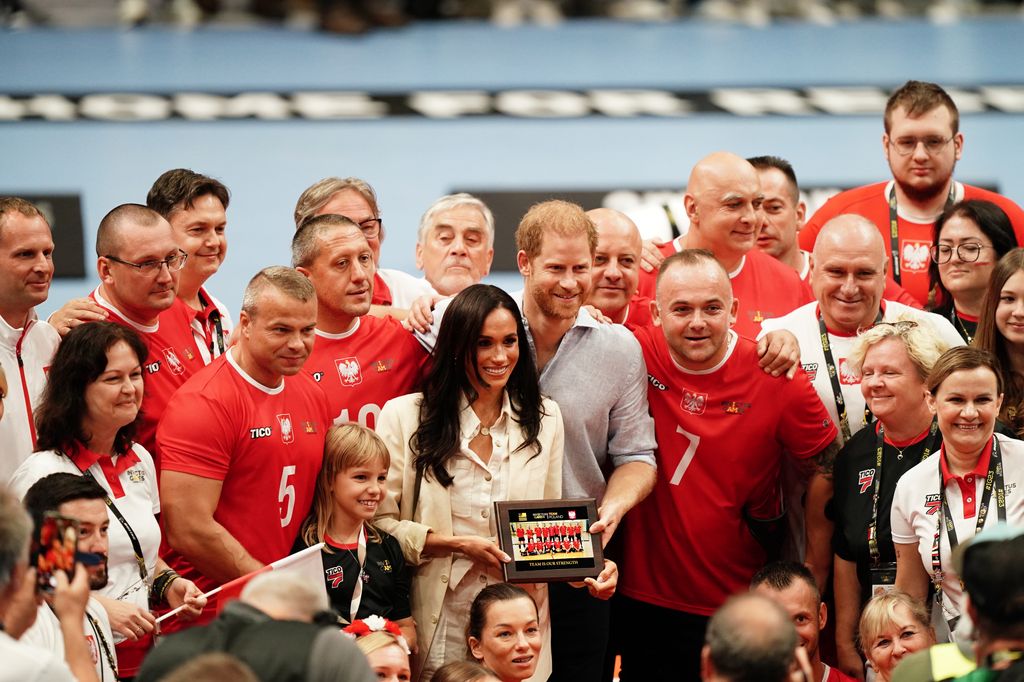 The Duke and Duchess pose with the Polish sitting volleyball team