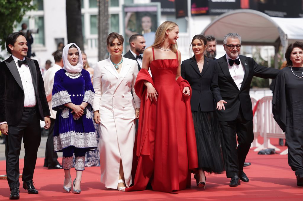 Director Sahra Mani, Jennifer Lawrence, Justine Ciarrocchi and guest sattend the "Anatomie D'une Chute (Anatomy Of A Fall)" red carpet 