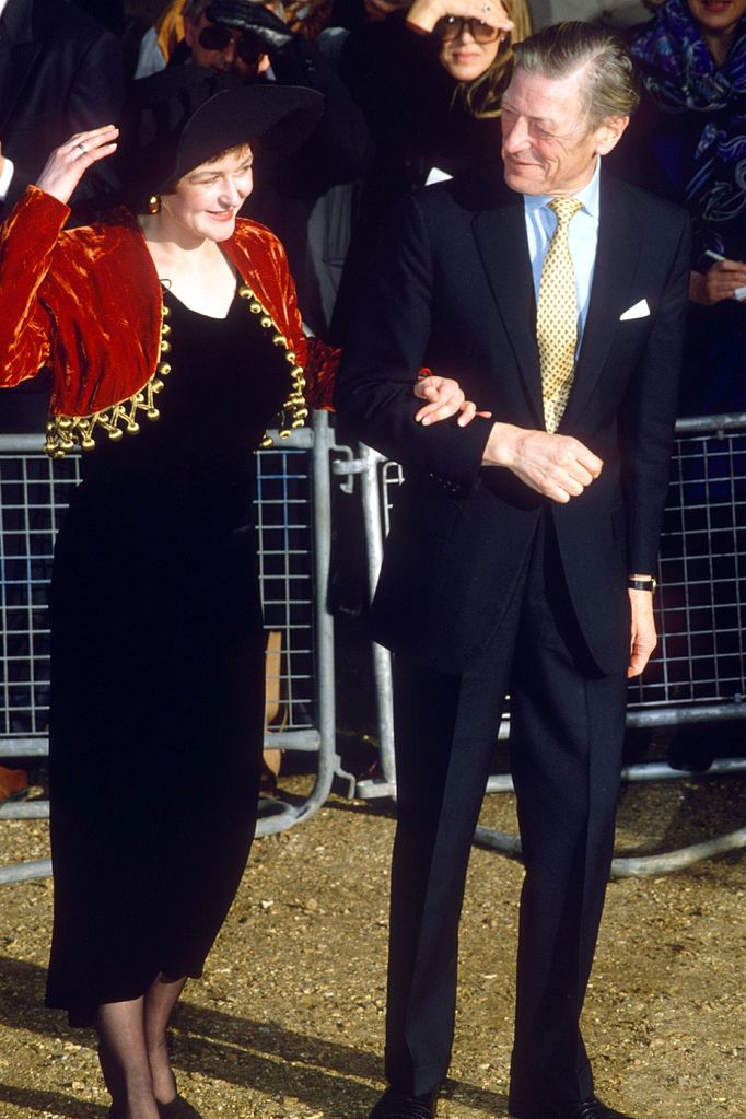 Marina Ogilvy in a black velvet dress and red jacket