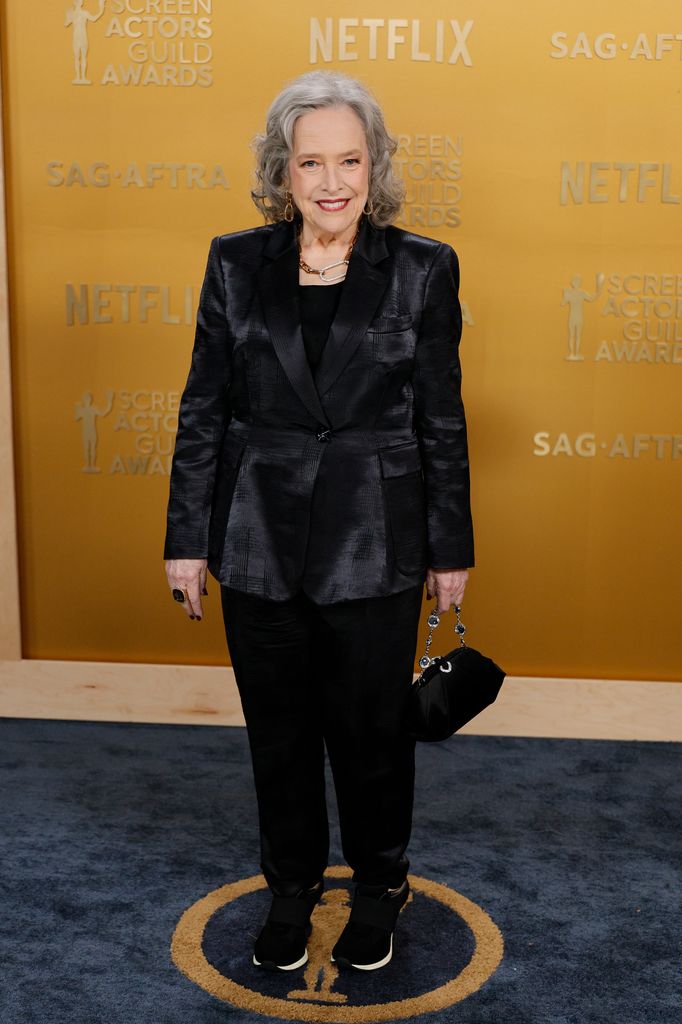 Kathy Bates looks incredible as she showcases 100lbs weight loss in elegant black suit on SAG red carpet