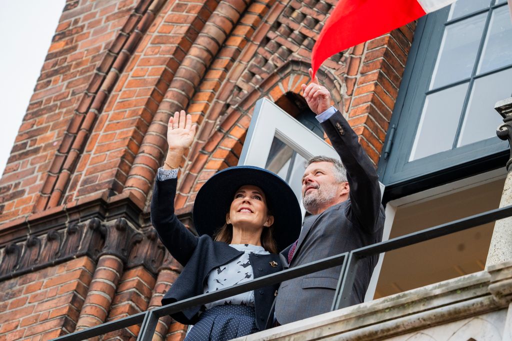 King Frederik X and Queen Mary on the balcony at City Hall in Vejle 