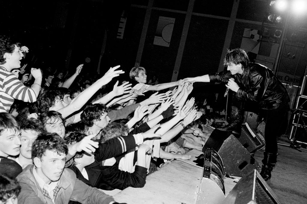 Irish Rock singer Bono, of the group U2, Maysfield Leisure Center, Belfast, Ireland, 1982. 