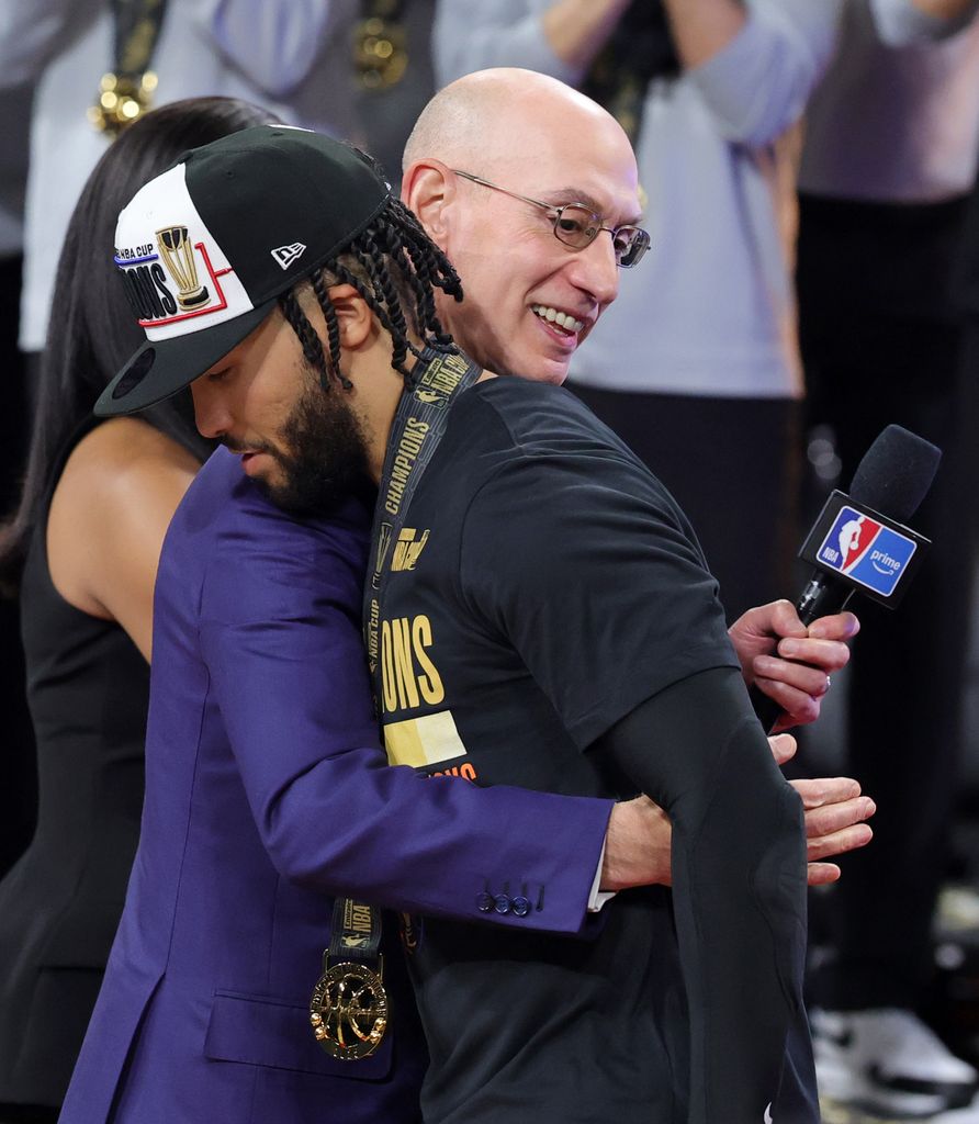 Adam Silver hugs Jalen Brunson at the NBA Cup