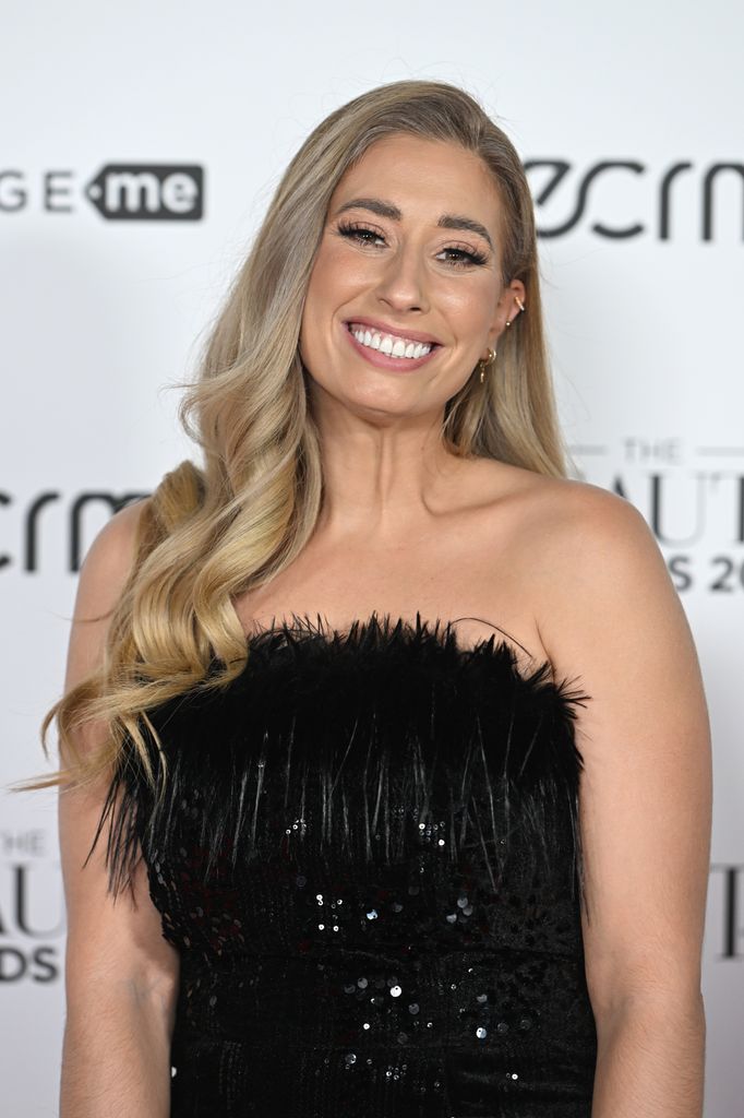 Stacey Solomon wearing a black dress