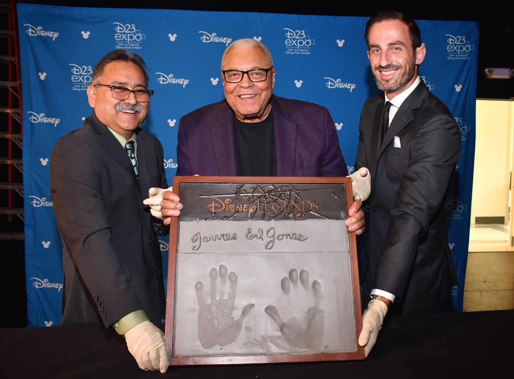 Actor James Earl Jones is shown casting his hand in cement for Disney during a special event in Pawling, New York on July 10, 2019. (Photo by John Atashian/Getty Images)