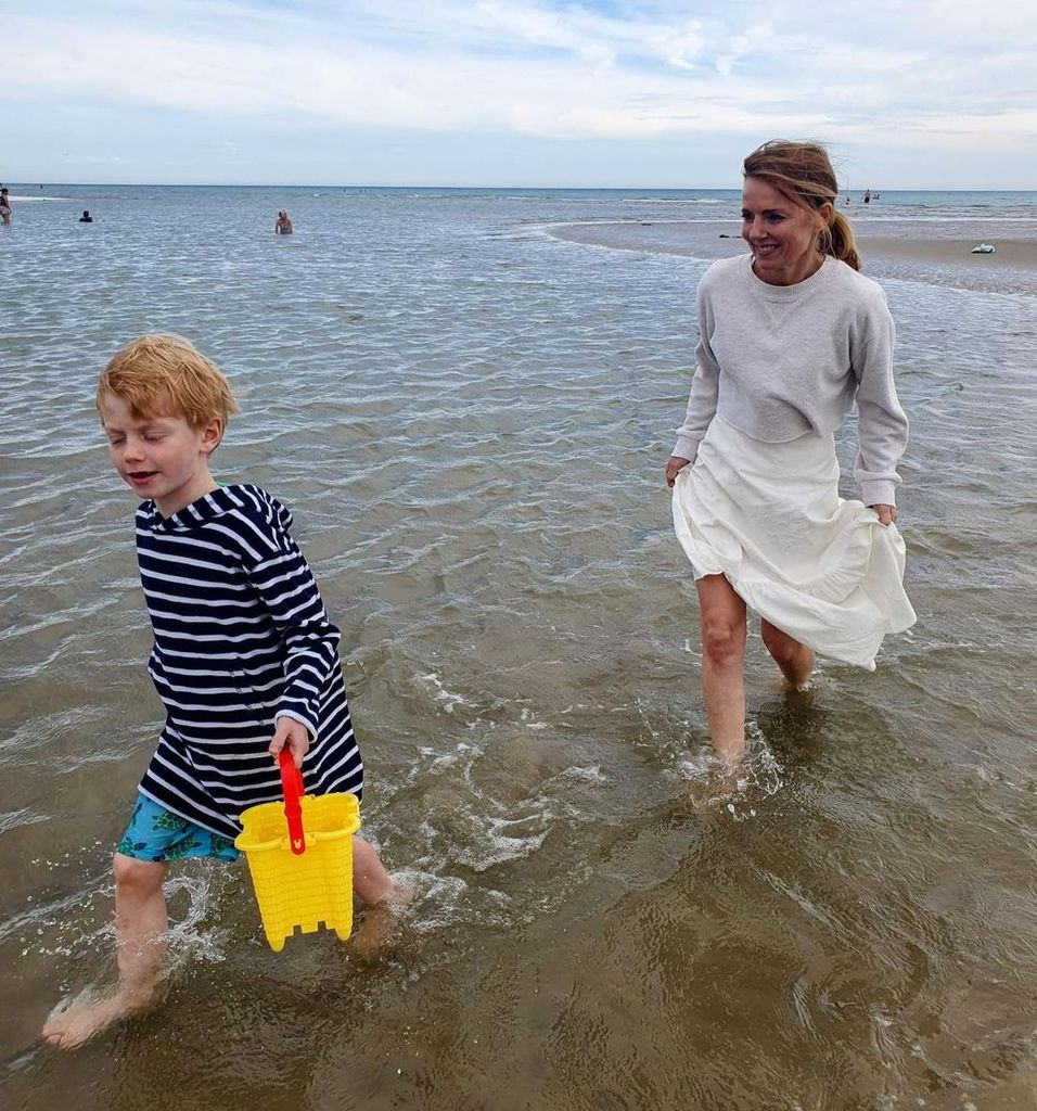 geri in the sea with son Monty 