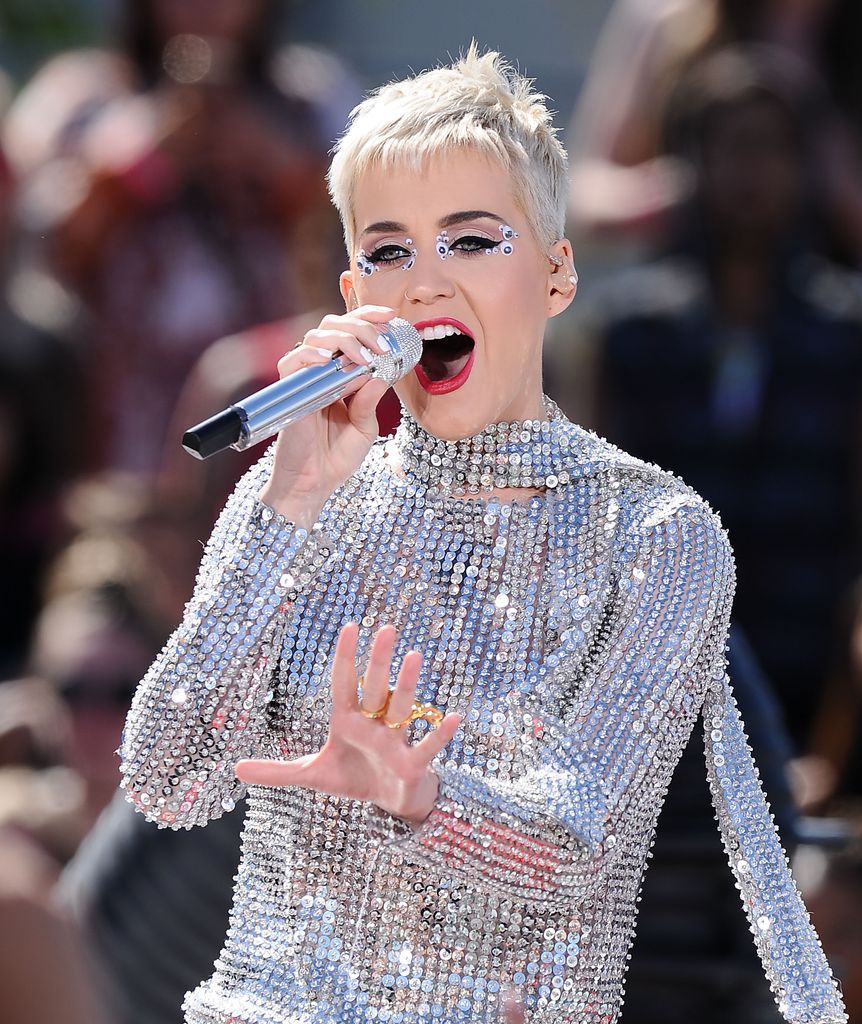 Katy Perry performs at the "Witness World Wide" with short blonde hair