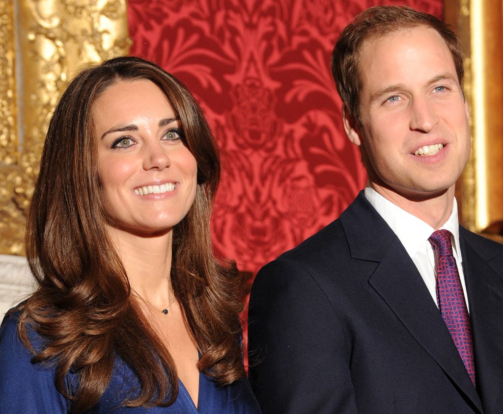 Prince William and Kate Middleton pose for photographers during a photocall to mark their engagement