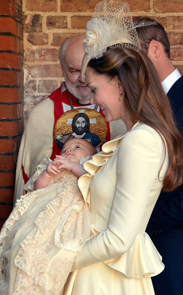 Kate carrying Prince George at his Christening in 2013
