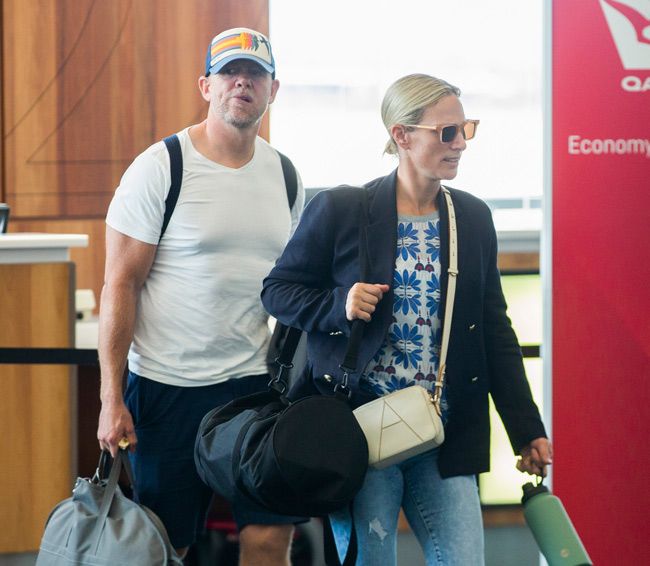 zara and mike carrying luggage