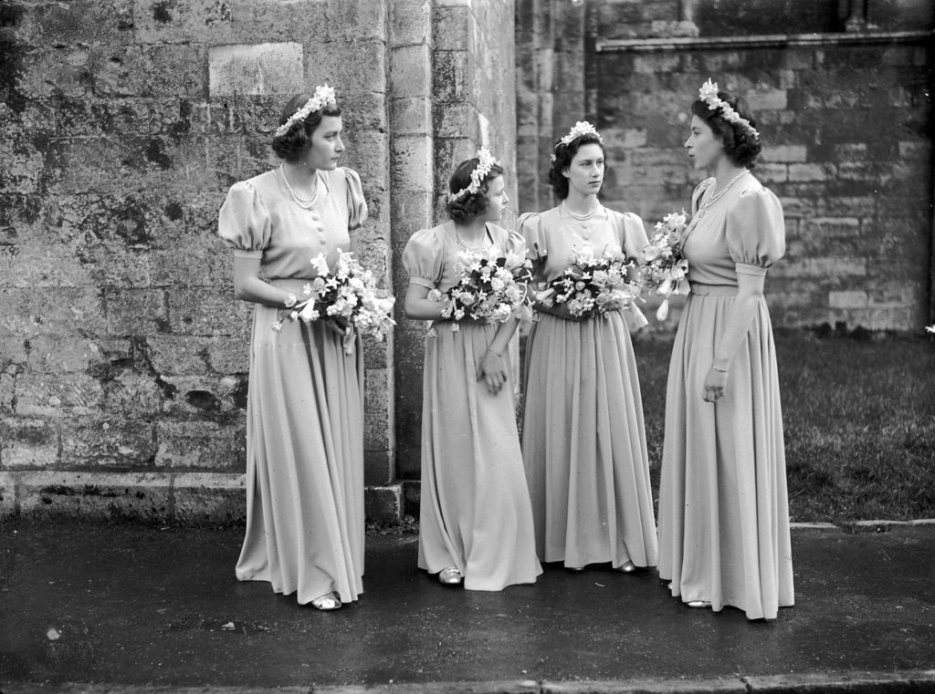 Pamela Mountbatten, Princess Alexandra of Kent, Princess Margaret and Princess Elizabeth outside Romsey Abbey after attending the wedding of Captain Lord Brabourne and Patricia Mountbatten