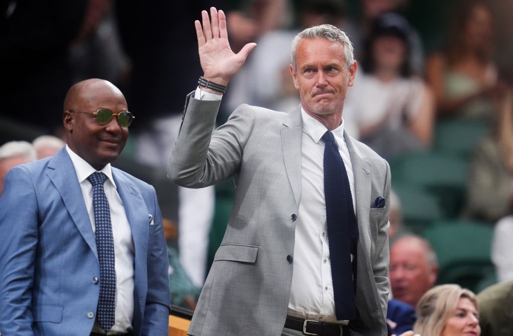 Mark Foster and Brian Lara (left) in the Royal Box on day seven of the 2025 Wimbledon Championships