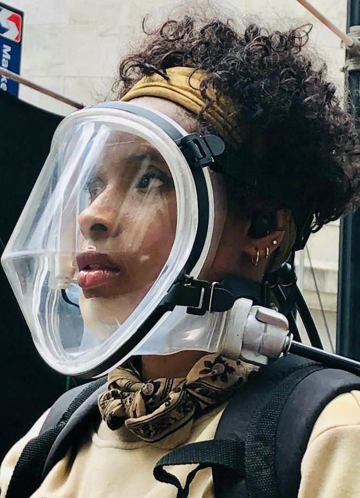 Photo shared by Jennifer Hudson on Instagram April 23, 2024 in which she is on set wearing a breathing mask, in a post promoting her new film Breathe.