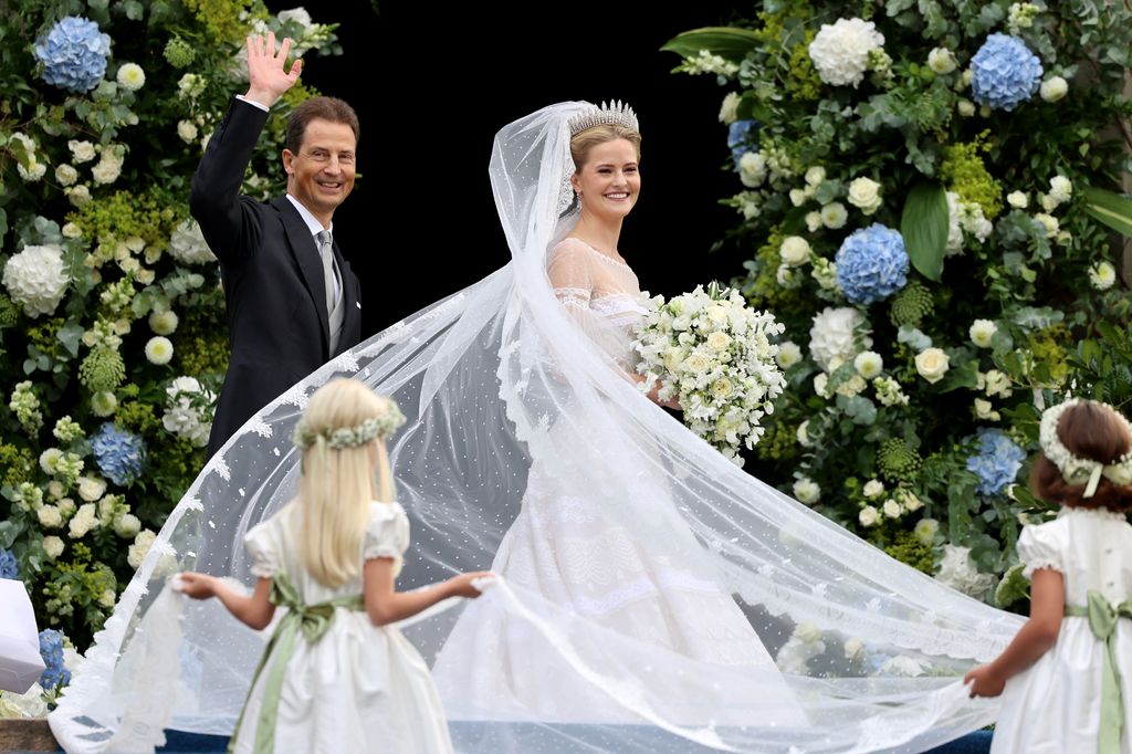 Alois, Hereditary Prince of Liechtenstein and Princess Marie Caroline Of Liechtenstein arrive at the wedding of Princess Marie Caroline of Liechtenstein To Mr Leopoldo Maduro Vollmer at Cathedral of St. Florin 
