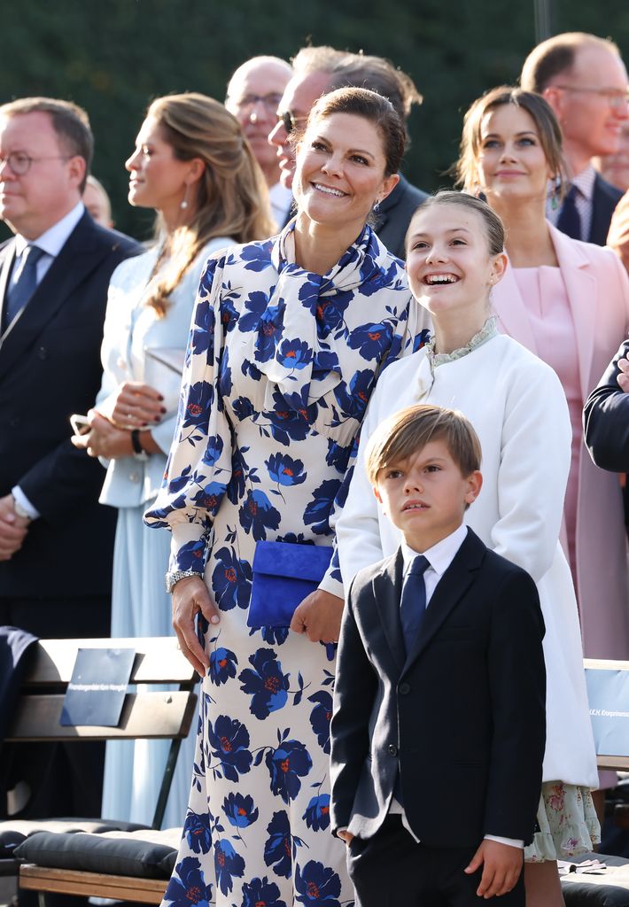 Princess Estelle with victoria and oscar looking up smiling
