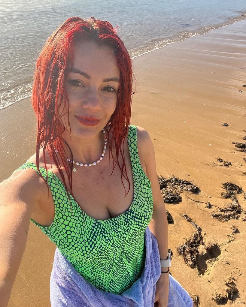 Dianne Buswell posing on the beach