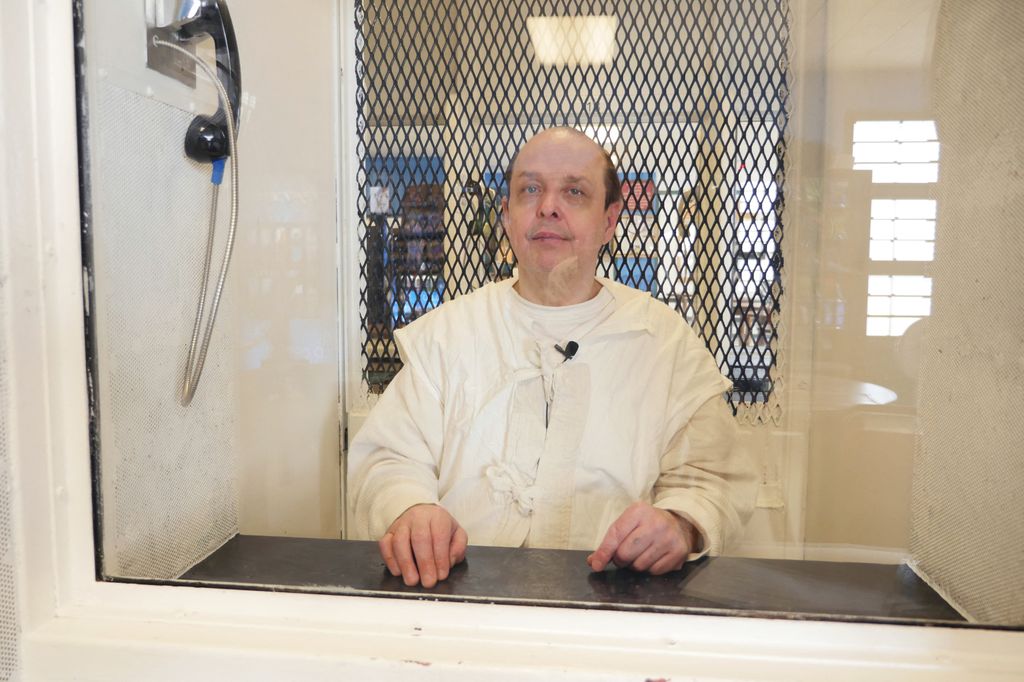 Robert Roberson, 58, spent almost 22 years on Texas death row for the 2002 death of his 2-year-old daughter, Nikki Curtis, sits behind glass at the Allan B. Polunsky Unit, the prison that houses the 169 men on Texas' death row in Livingston, Texas, January 22, 2025