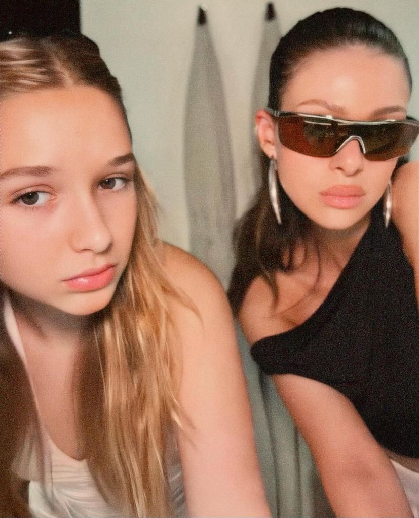 Harper Beckham and Nicola Peltz pouting for the camera