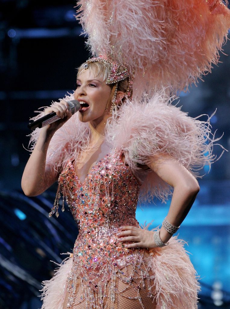 Singer Kylie Minogue performs on stage for the opening night of her Showgirl Homecoming Tour at the Sydney Entertainment Centre on November 11, 2006 in Sydney, Australia