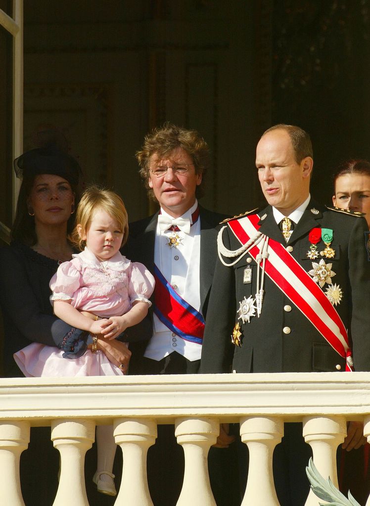 Princess Caroline of Monaco, her daughter Princess Alexandra, Prince Ernst August of Hanover, Prince Albert of Monaco and Princess Stephanie watch the National Day parade from the balcony of the Monaco Palace November 19, 2002 in Monte Carlo, Monaco. 