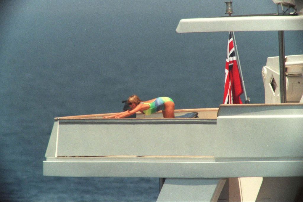 Princess Diana stretching on the deck of a yacht