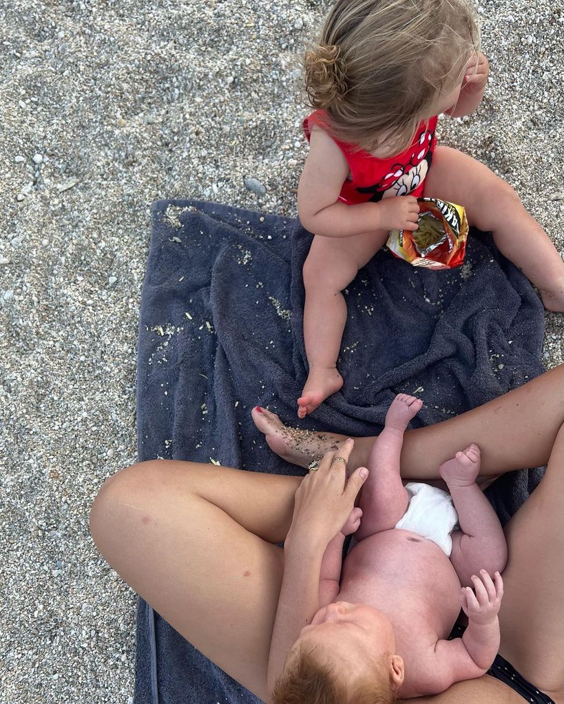 A photo of newborn baby Frankie on holiday with mum Carrie and sister Romy 