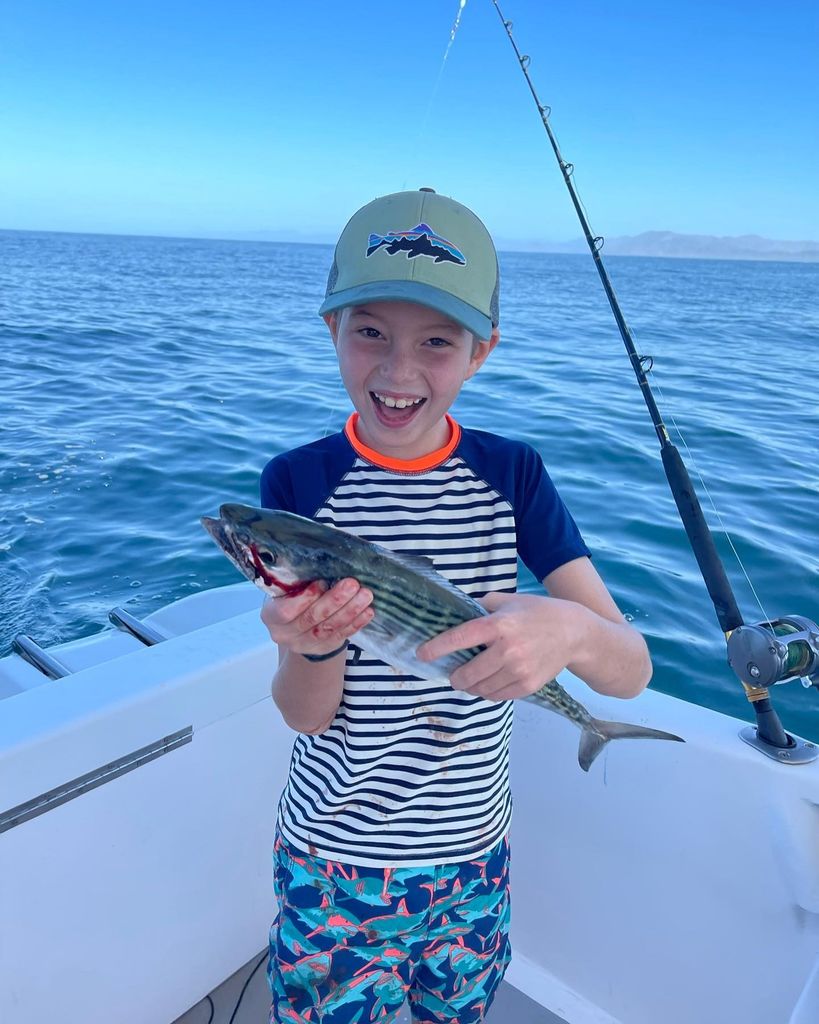 photo of ivanka son joseph holding a fish