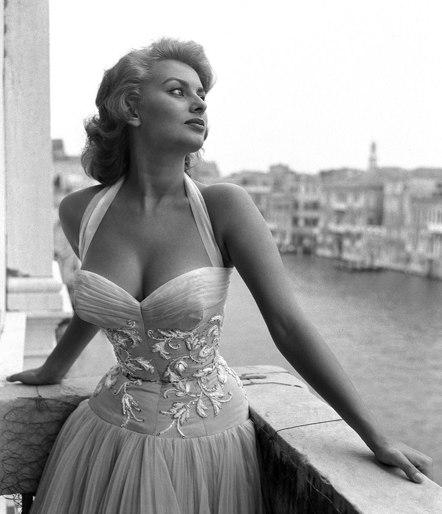 Sophia Loren posing on the balcony of the Venetian palazzo in 1955