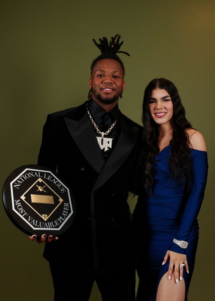 Ronald Acuña Jr. #13 of the Atlanta Braves poses for a portrait with his wife Maria Laborde at New York Hilton Midtown on Saturday, January 27, 2024 in New York, New York