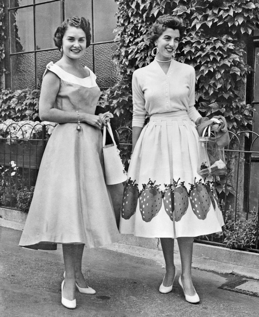 Dolly Seixas and Shauna Trabert, right, wives of the two well-known seeded American net stars took the fashion spotlight for spectators as they arrived to watch the women's singles matches.