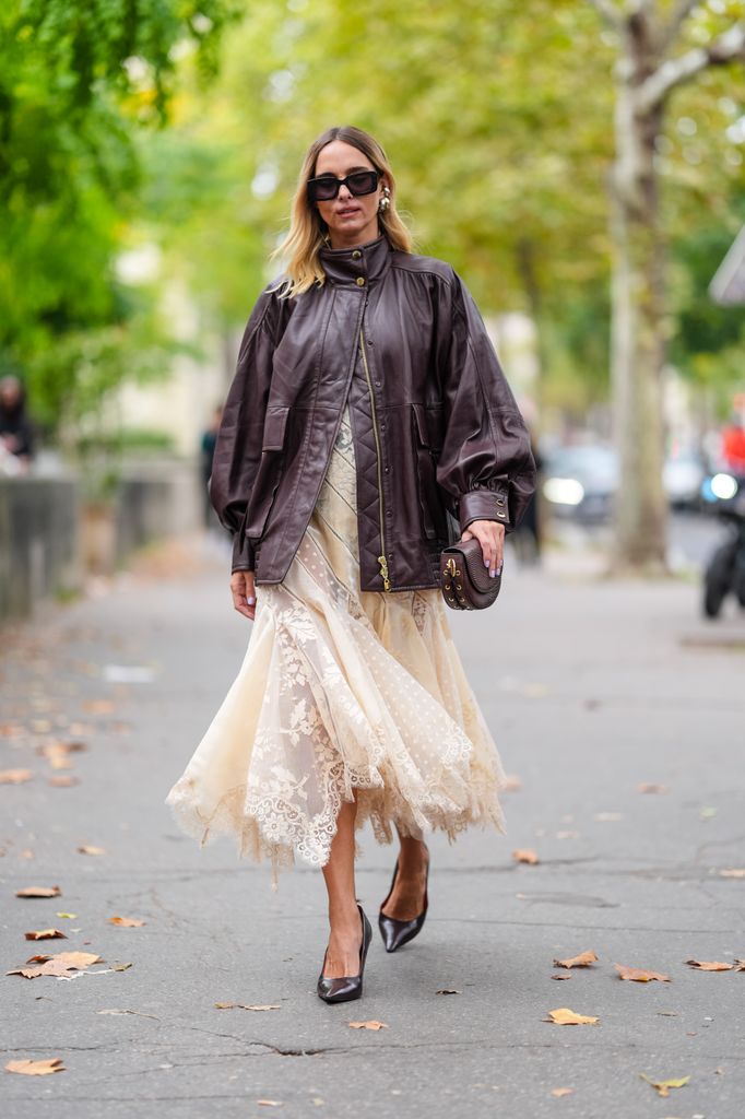 Candela Novembre sporting a Zimmerman cream lace dress and leather jacket 