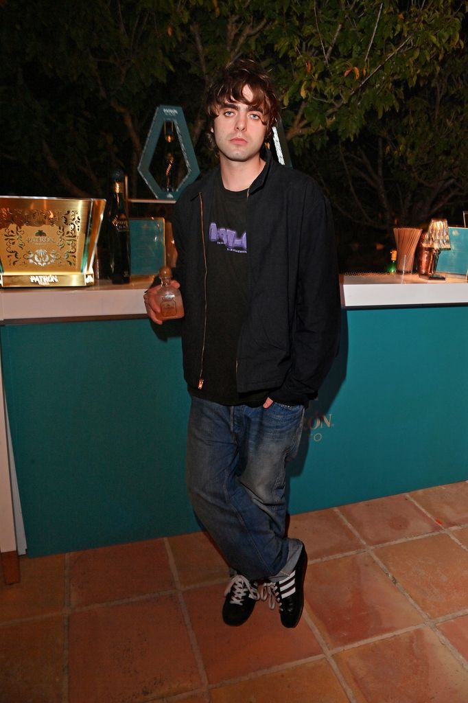 Lennon Gallagher wears jeans and hoodie