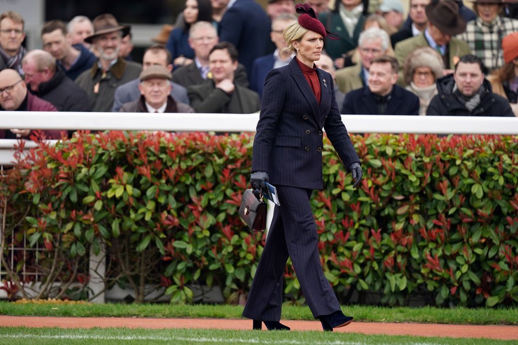 Zara Tindall at racecourse in navy suit
