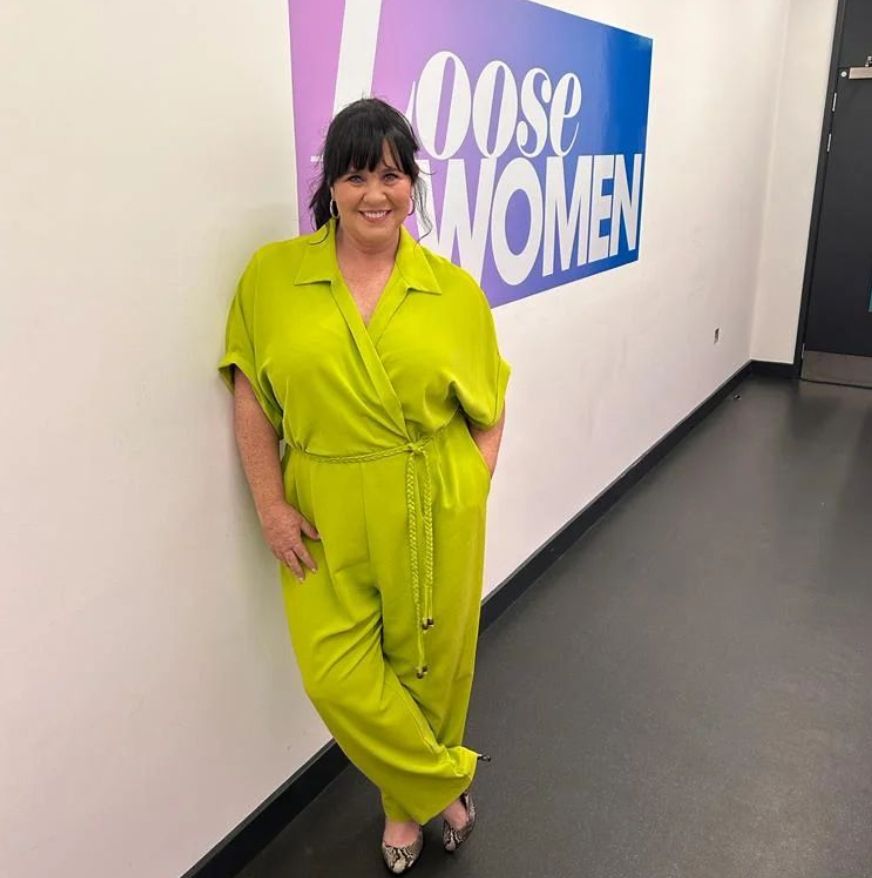 Coleen Nolan in lime green outfit