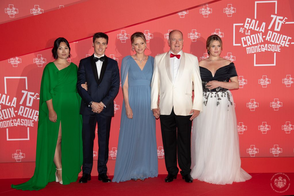 prince albert and princess charlene pose on red carpet with  Camille Gottlieb et Monsieur et Madame Louis Ducruet 