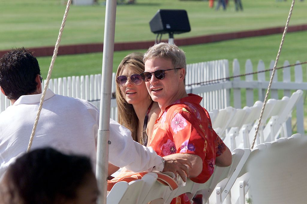 Elizabeth Hurley with Steve Bing at opening day at the Mercedes-Benz Polo Challenge at the Bridgehampton Polo Club in Bridgehampton, New York. 07/14/2001