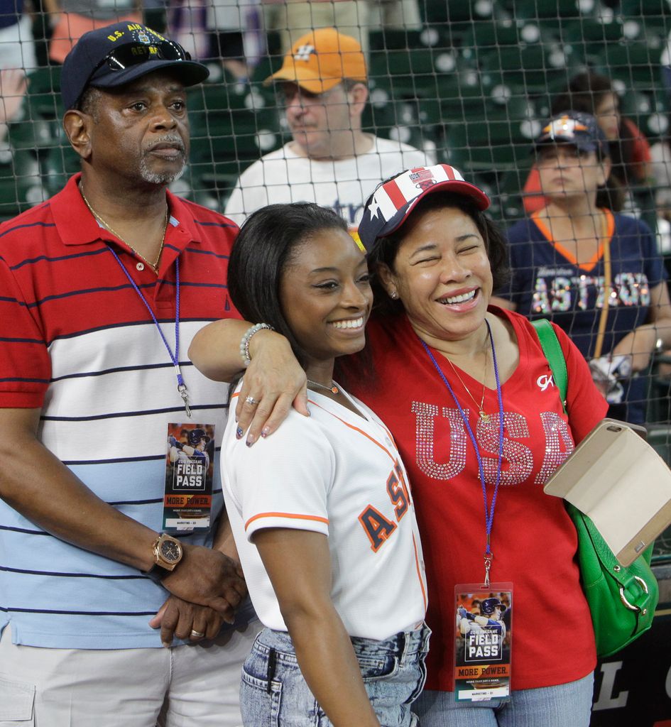 Simone Biles from Spring with her father Ron Biles and her adoptive mother Nellie Biles. 