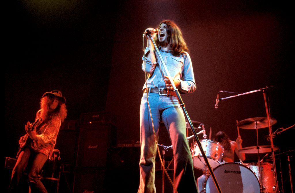photo of ian gillan singing on stage 