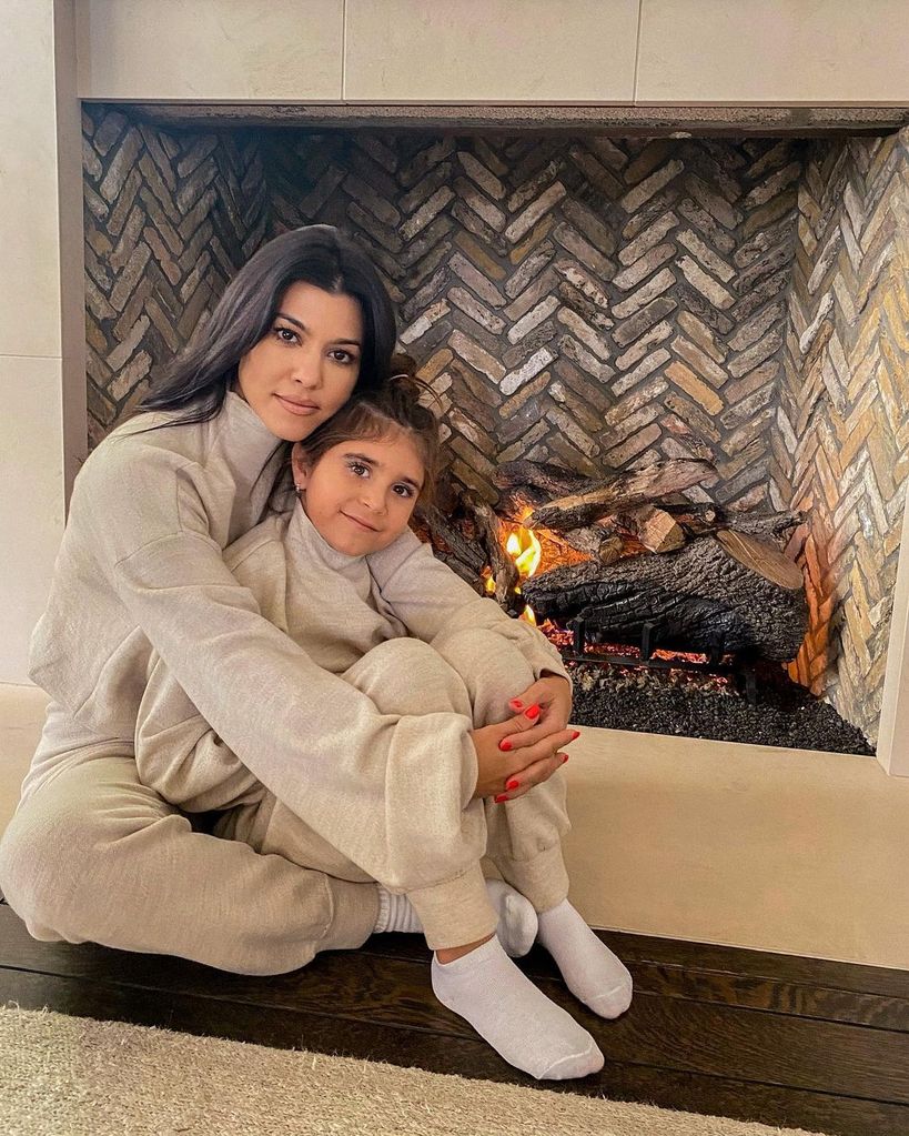 Kourtney Kardashian and daughter Penelope pose in matching pajamas