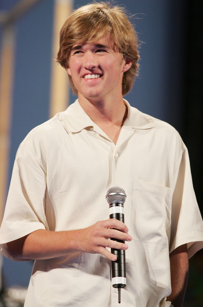 Haley Joel Osment wearing a cream shirt