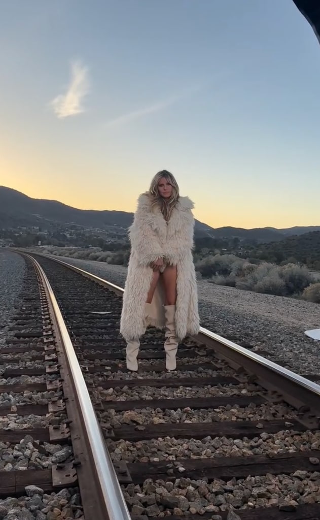 heidi kum fur coat topless