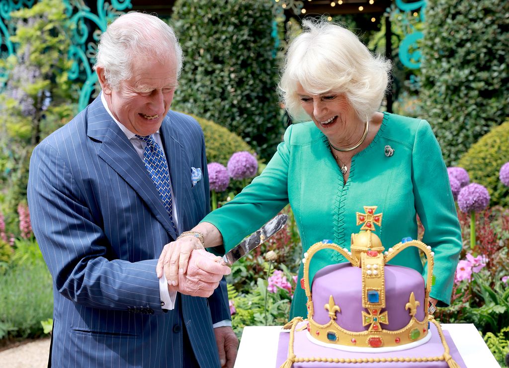 Charles and Camilla cutting cake