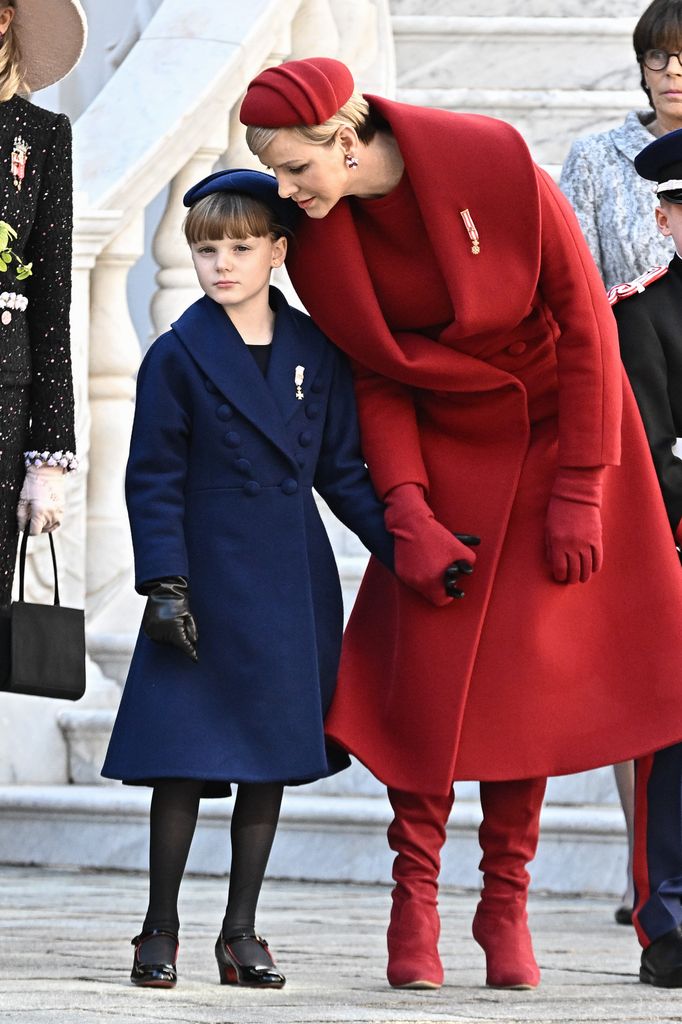 Princess Gabriella and Princess Charlene in coats 