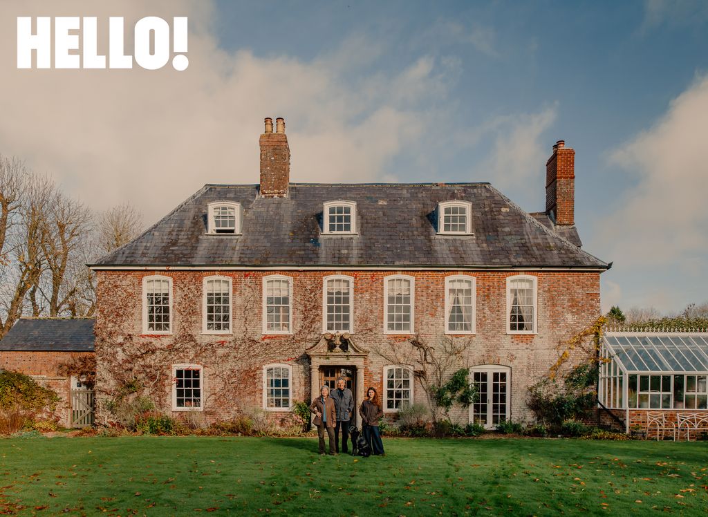 Emmanuel Olympitis outside his house with his family